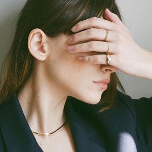 Loren Stewart Herringbone gold necklace.